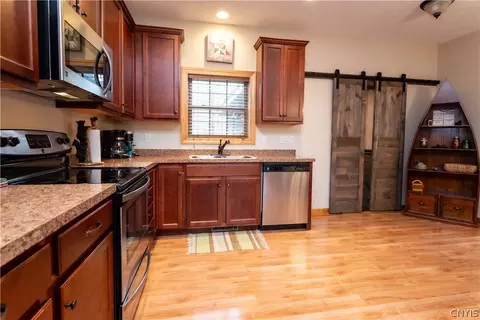 Kitchen - 103 Pawnee Dr, Webb, NY 13420 photo 2 of 3