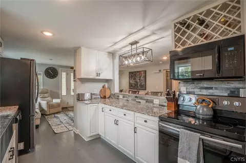 Kitchen - 79 E Oneida St, Lysander, NY 13027 photo 4 of 5
