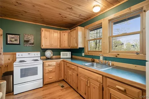 Kitchen - 165 Seneca Rd, Webb, NY 13420 photo 1 of 3