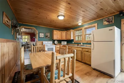Kitchen - 165 Seneca Rd, Webb, NY 13420 photo 2 of 3