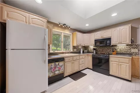 Kitchen - 80 E 8th St, Vernon, NY 13421 photo 2 of 3