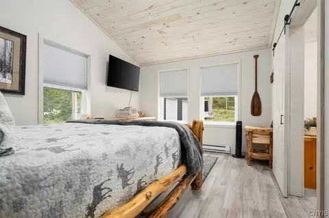 Bedroom - 583 S Shore Rd, Webb, NY 13420 photo 5 of 8