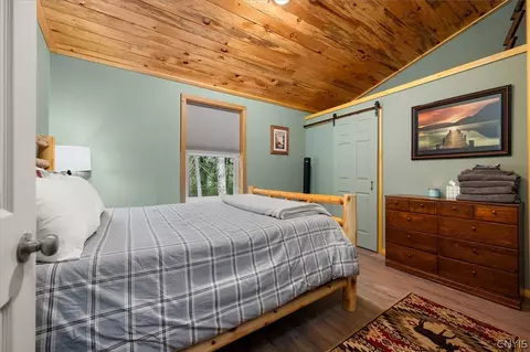 Bedroom - 583 S Shore Rd, Webb, NY 13420 photo 1 of 8