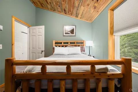 Bedroom - 583 S Shore Rd, Webb, NY 13420 photo 2 of 8