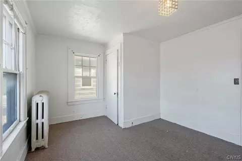 Bedroom - 129 E Main St, Waterloo, NY 13165 photo 8 of 10