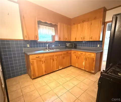 Kitchen - 23 State St, Oneida, NY 13421 photo 2 of 3