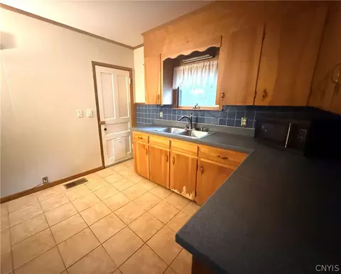 Kitchen - 23 State St, Oneida, NY 13421 photo 3 of 3