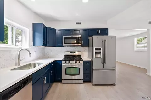 Kitchen - 69 Larned Rd, Schroeppel, NY 13132 photo 2 of 2