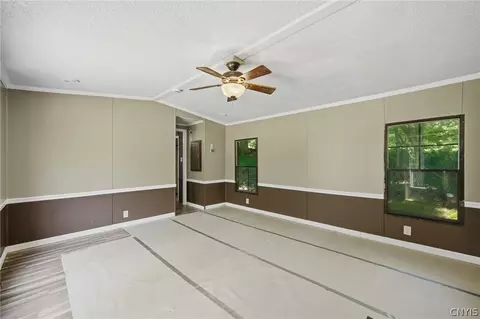 Living - 46 Canal Rd, Schroeppel, NY 13135 photo 2 of 3