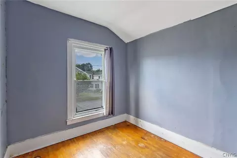 Bedroom - 65 E 7th St, Oswego, NY 13126 photo 7 of 8