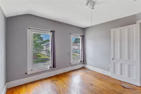 Bedroom - 65 E 7th St, Oswego, NY 13126 photo 5 of 8