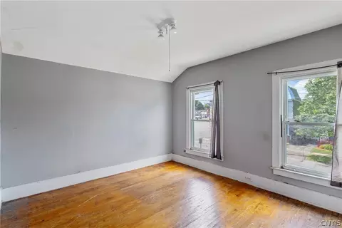Bedroom - 65 E 7th St, Oswego, NY 13126 photo 4 of 8