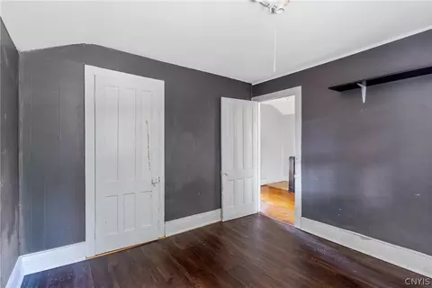 Bedroom - 65 E 7th St, Oswego, NY 13126 photo 3 of 8