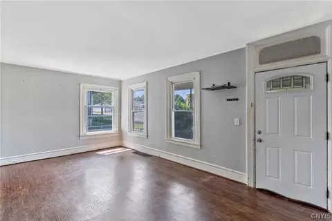 Living - 65 E 7th St, Oswego, NY 13126 photo 1 of 5