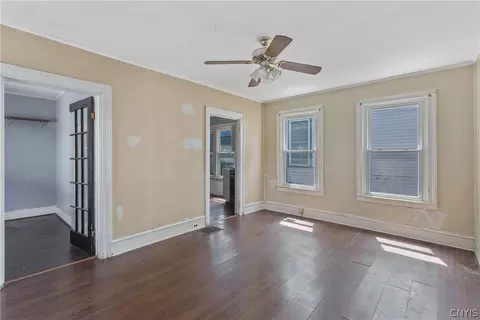 Living - 65 E 7th St, Oswego, NY 13126 photo 4 of 5