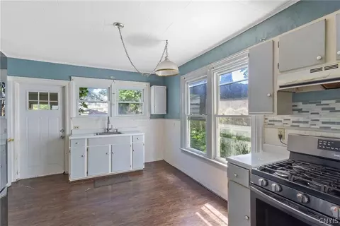 Kitchen - 65 E 7th St, Oswego, NY 13126 photo 1 of 3