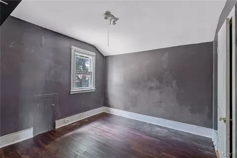 Bedroom - 65 E 7th St, Oswego, NY 13126 photo 2 of 8