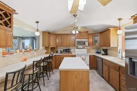 Kitchen - 8393 River Rd, Lysander, NY 13027 photo 2 of 4