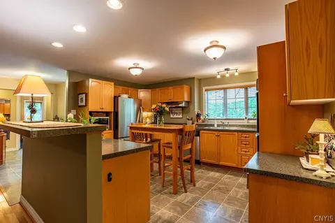 Kitchen - 105 Mingo Rd, Webb, NY 13420 photo 1 of 2