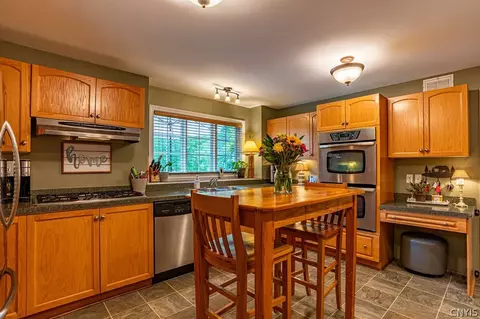 Kitchen - 105 Mingo Rd, Webb, NY 13420 photo 2 of 2