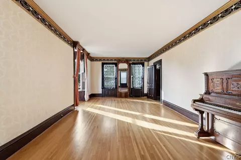 Living - 89 E Mohawk St, Oswego, NY 13126 photo 1 of 3