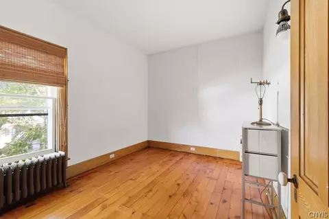 Bedroom - 89 E Mohawk St, Oswego, NY 13126 photo 7 of 8
