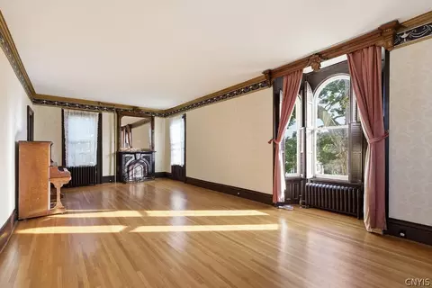 Living - 89 E Mohawk St, Oswego, NY 13126 photo 2 of 3