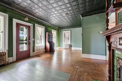 Living - 89 E Mohawk St, Oswego, NY 13126 photo 3 of 3