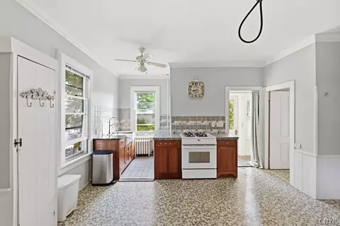 Kitchen - 89 E Mohawk St, Oswego, NY 13126 photo 2 of 3