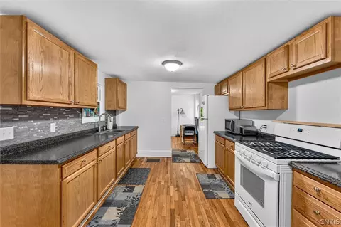 Kitchen - 88 E 8th St, Oswego, NY 13126 photo 1 of 4