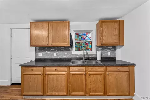 Kitchen - 88 E 8th St, Oswego, NY 13126 photo 3 of 4