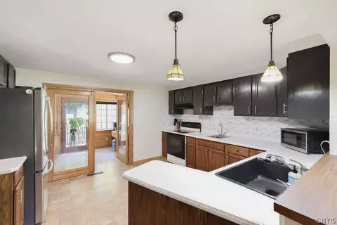 Kitchen - 8243 Sixty Rd, Lysander, NY 13027 photo 3 of 4