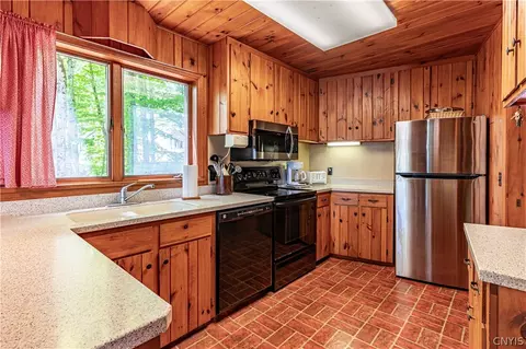 Kitchen - 116 Fedder Rd, Webb, NY 13420 photo 2 of 3