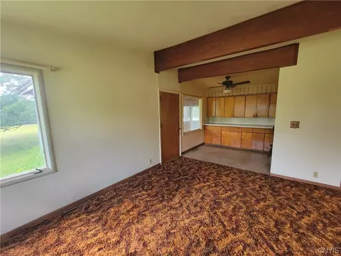 Living - 7670 River Rd, Lysander, NY 13027 photo 4 of 7
