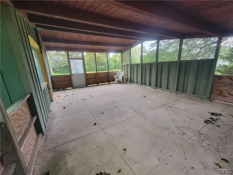 Exterior - 7670 River Rd, Lysander, NY 13027 photo 4 of 8