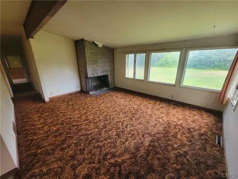 Living - 7670 River Rd, Lysander, NY 13027 photo 1 of 7