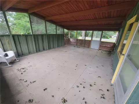 Exterior - 7670 River Rd, Lysander, NY 13027 photo 3 of 8