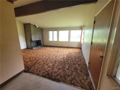 Living - 7670 River Rd, Lysander, NY 13027 photo 3 of 7