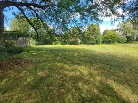 Exterior - 7670 River Rd, Lysander, NY 13027 photo 6 of 8