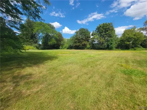 Exterior - 7670 River Rd, Lysander, NY 13027 photo 7 of 8