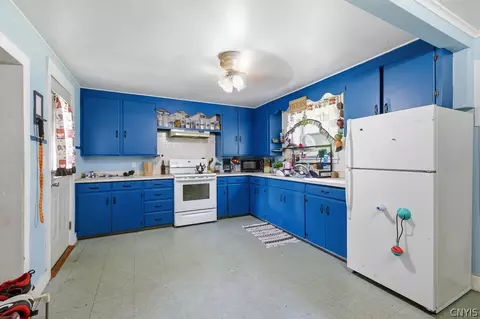 Kitchen - 24 Spring St, Schroeppel, NY 13135 photo 1 of 3