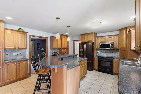 Kitchen - 6418 Killoe Rd, Lysander, NY 13027 photo 3 of 5
