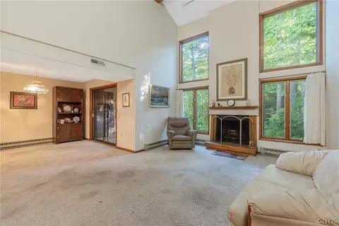 Living - 8708 E Patrol Rd, Lysander, NY 13027 photo 2 of 8
