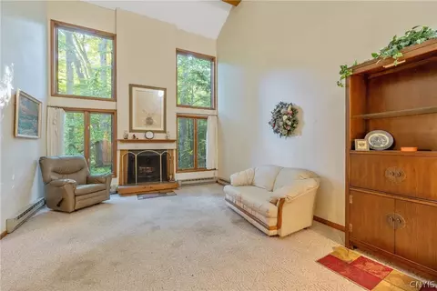 Living - 8708 E Patrol Rd, Lysander, NY 13027 photo 3 of 8