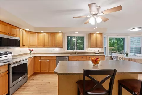 Kitchen - 8763 Foxfire Ln, Lysander, NY 13027 photo 3 of 10