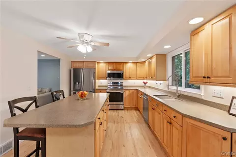 Kitchen - 8763 Foxfire Ln, Lysander, NY 13027 photo 5 of 10