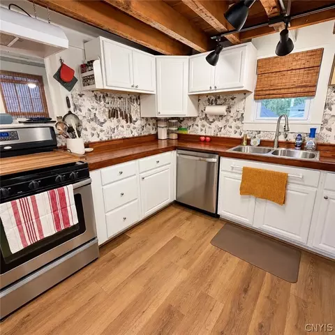 Kitchen - 140 E 3rd St, Oswego, NY 13126 photo 1 of 3