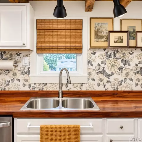 Kitchen - 140 E 3rd St, Oswego, NY 13126 photo 2 of 3