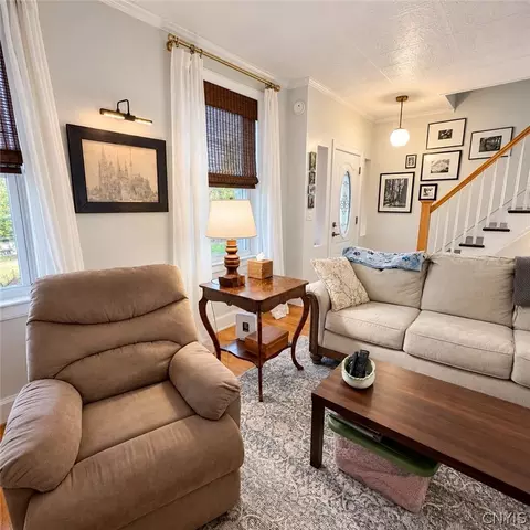 Living - 140 E 3rd St, Oswego, NY 13126 photo 1 of 2