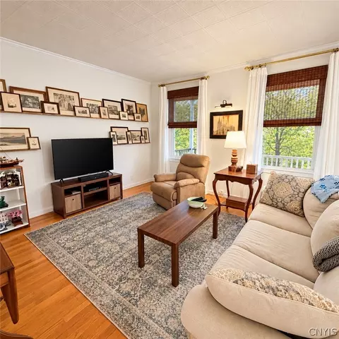 Living - 140 E 3rd St, Oswego, NY 13126 photo 2 of 2